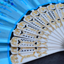 Handheld vintage folding fan with traditional Chinese patterns, ideal for cooling or decoration. Fabric sleeve included.